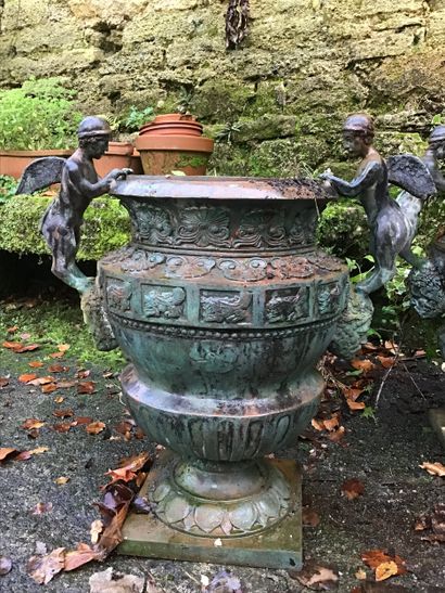 Pair of cast bronze vases decorated with...