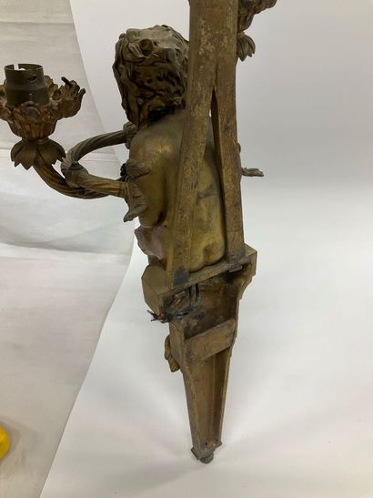 Pair of bronze sconces decorated with a mermaid...