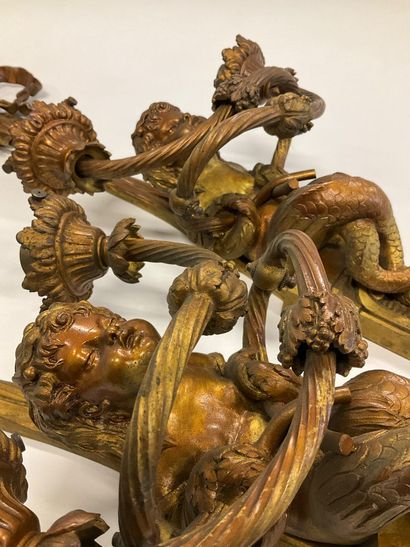 Pair of bronze sconces decorated with a mermaid...