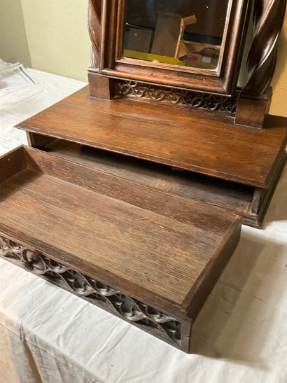 A neo-Gothic style oak psyche. One drawer....