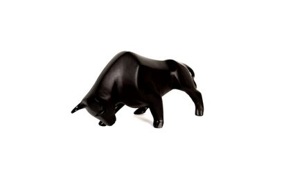 Black patina animal bronze featuring a bull...