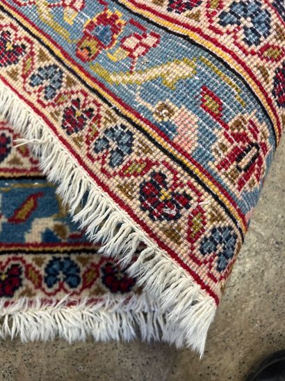 An Oriental rug, size approx. 4.30 m x 3...