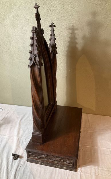 A neo-Gothic style oak psyche. One drawer....