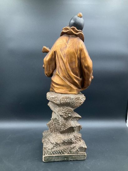 Statuette of Pierrot playing the guitar....