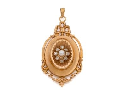 Pendentif en or 750 millièmes estampé, retenant...