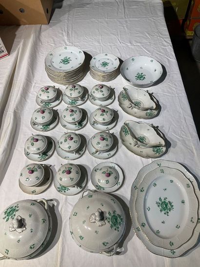 A porcelain service with floral decoration....