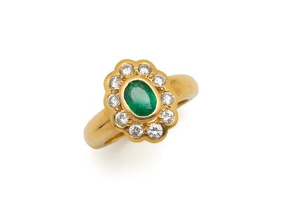 Daisy ring in 750 thousandths gold set with...