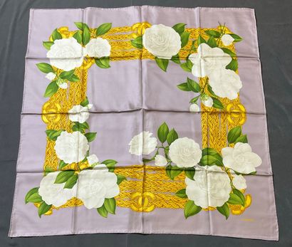Chanel scarf decorated with camellias and...