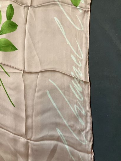 Pale pink Chanel stole decorated with white...
