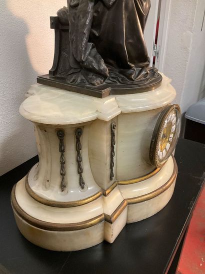 A late 19th century mantel clock. White marble...