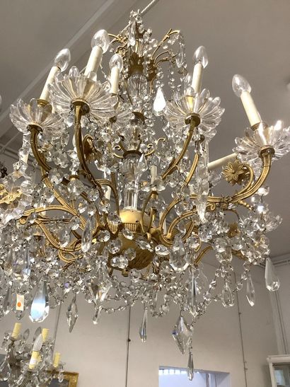 Large chandelier with crystal pendants and...
