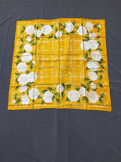 Yellow Chanel scarf with white flower design....