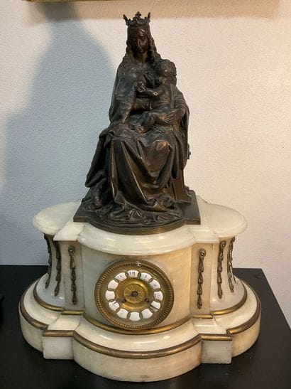 A late 19th century mantel clock. White marble...