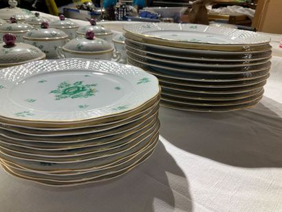 A porcelain service with floral decoration....