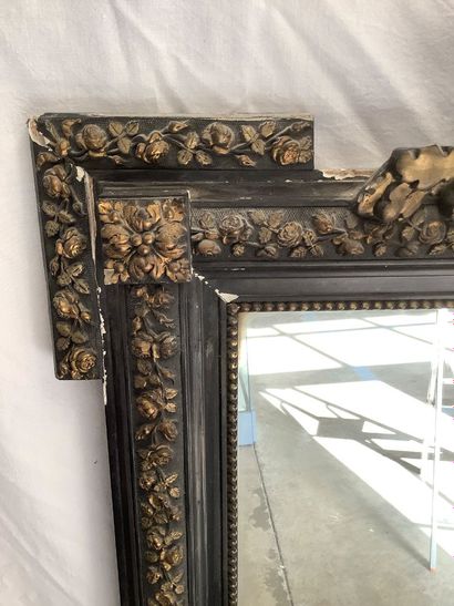 Large Napoleon III style mantel mirror. The...