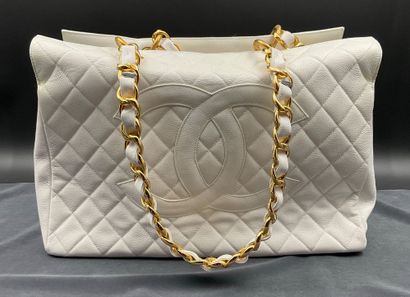CHANEL, Large white quilted leather tote...