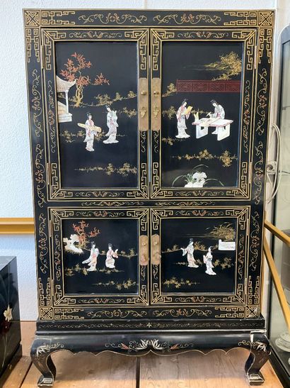 China: a 4-door cabinet in lacquered wood...