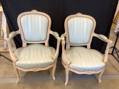 Set of two Louis XV style armchairs in carved...