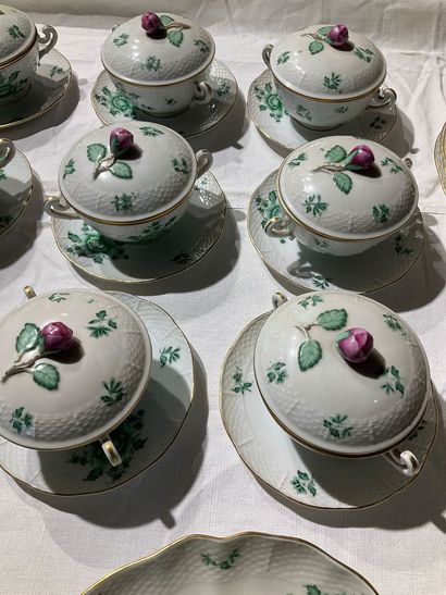 A porcelain service with floral decoration....