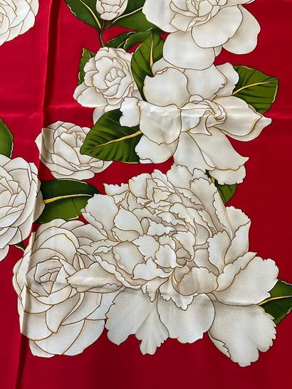 Red Chanel scarf with white camellia decoration...