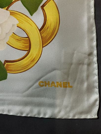 Very light blue Chanel scarf adorned with...