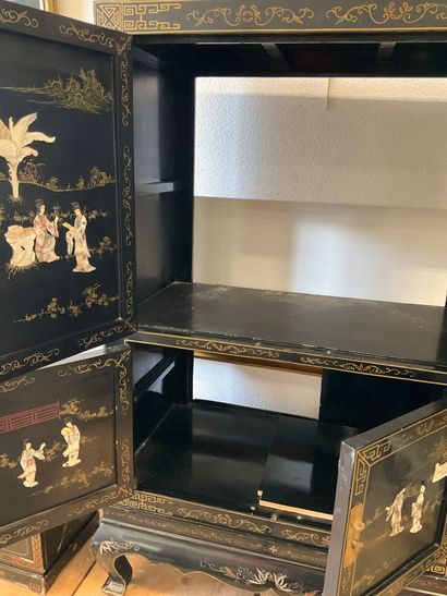 China: a 4-door cabinet in lacquered wood...