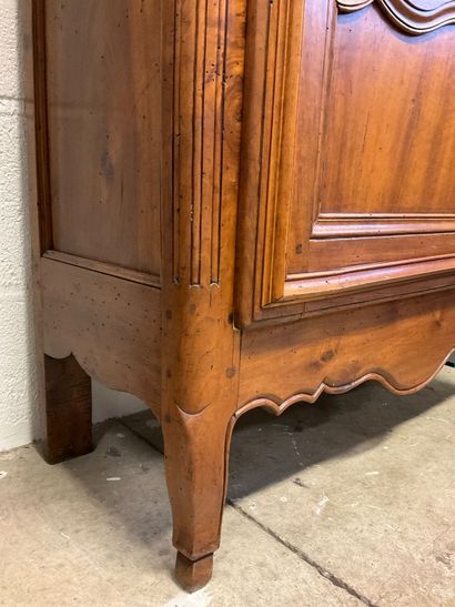 A walnut armoire. Louis XV/Louis XVI style....