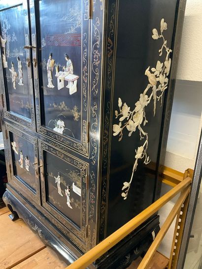 China: a 4-door cabinet in lacquered wood...