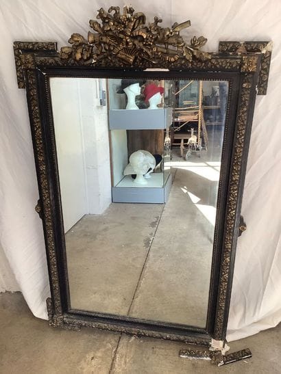Large Napoleon III style mantel mirror. The...