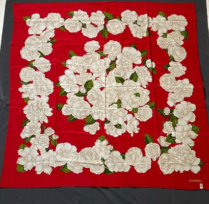 Red Chanel scarf with white camellia decoration...