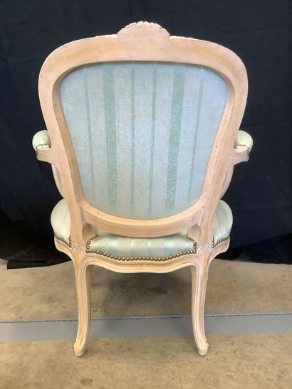 Set of two Louis XV style armchairs in carved...