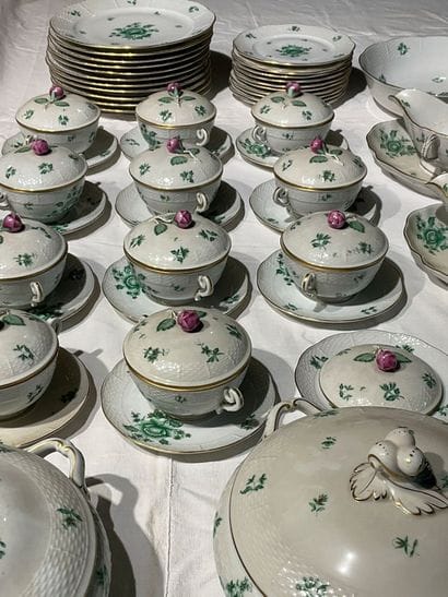 A porcelain service with floral decoration....
