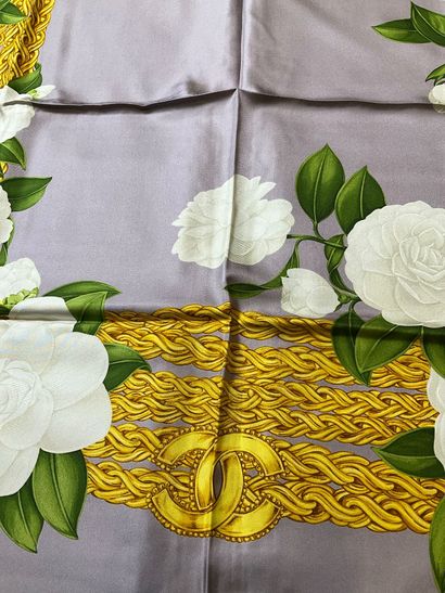 Chanel scarf decorated with camellias and...