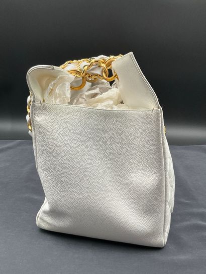 CHANEL, Large white quilted leather tote...