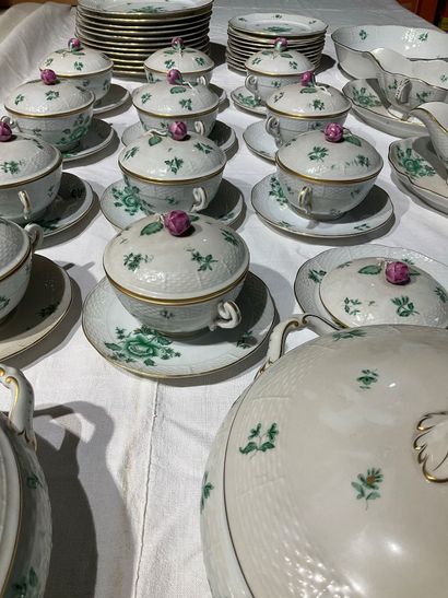 A porcelain service with floral decoration....