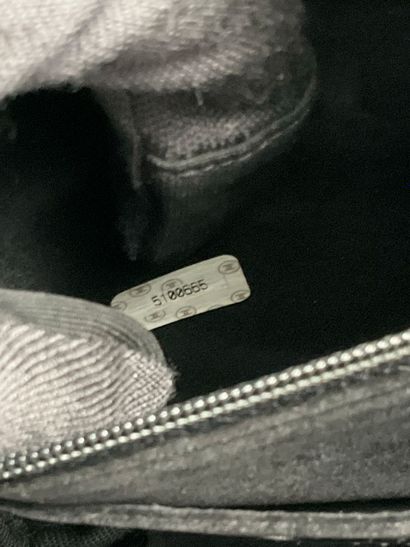 CHANEL. Black vinyl vanity case number 5100665....