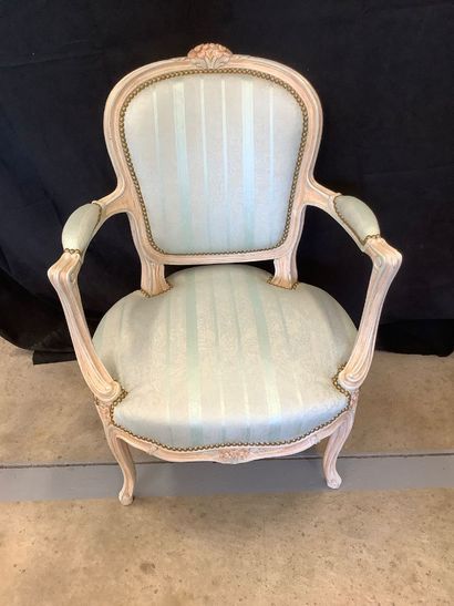 Set of two Louis XV style armchairs in carved...
