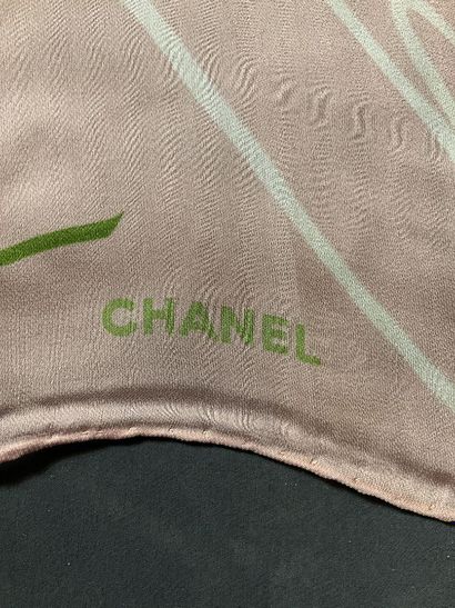 Pale pink Chanel stole decorated with white...