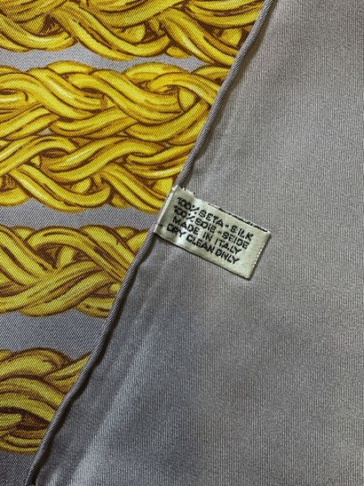 Chanel scarf decorated with camellias and...