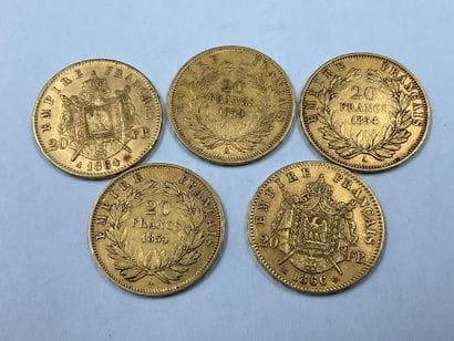 Cinq pièces de 20 francs Napoléon III. Poids...