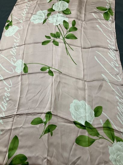 Pale pink Chanel stole decorated with white...