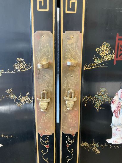 China: a 4-door cabinet in lacquered wood...