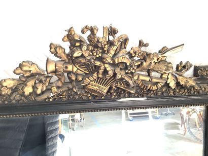 Large Napoleon III style mantel mirror. The...