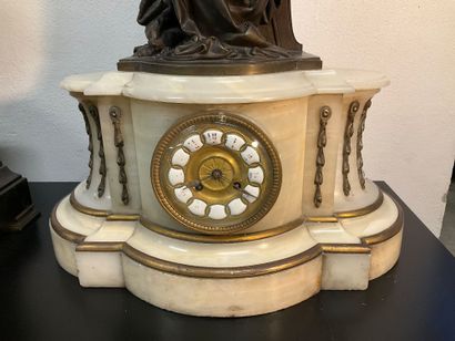 A late 19th century mantel clock. White marble...