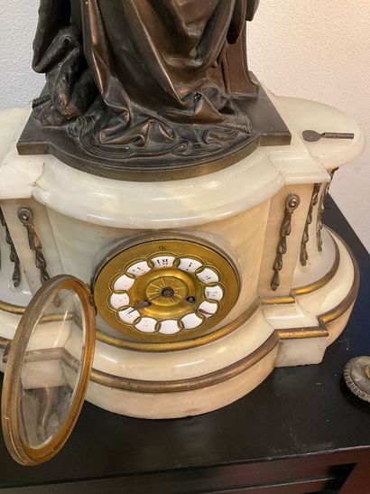 A late 19th century mantel clock. White marble...