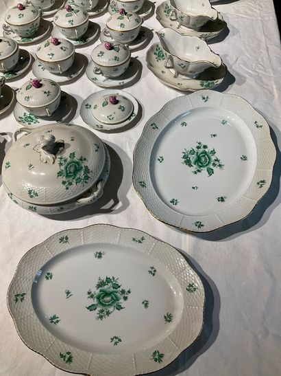A porcelain service with floral decoration....