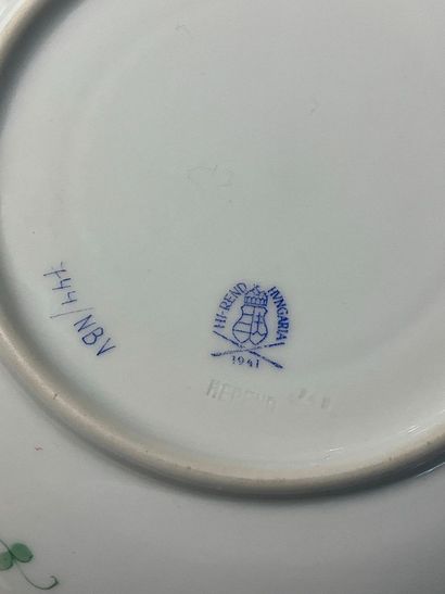 A porcelain service with floral decoration....