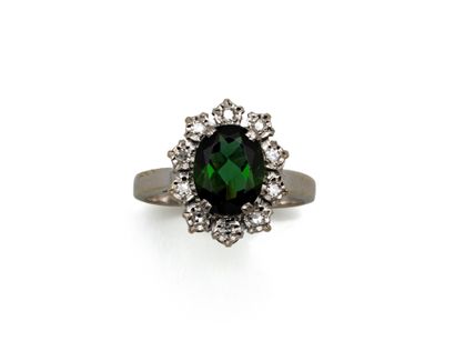 750 thousandths white gold ring set with...