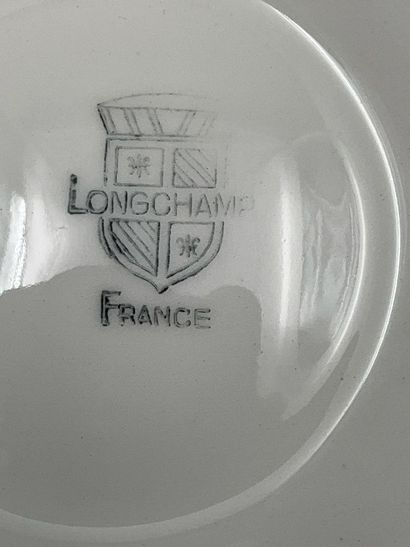 LONGCHAMP. Service à huîtres en barbotine...