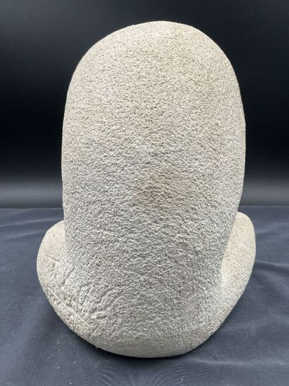 Stone sculpture titled “Maternal Love,” unsigned....